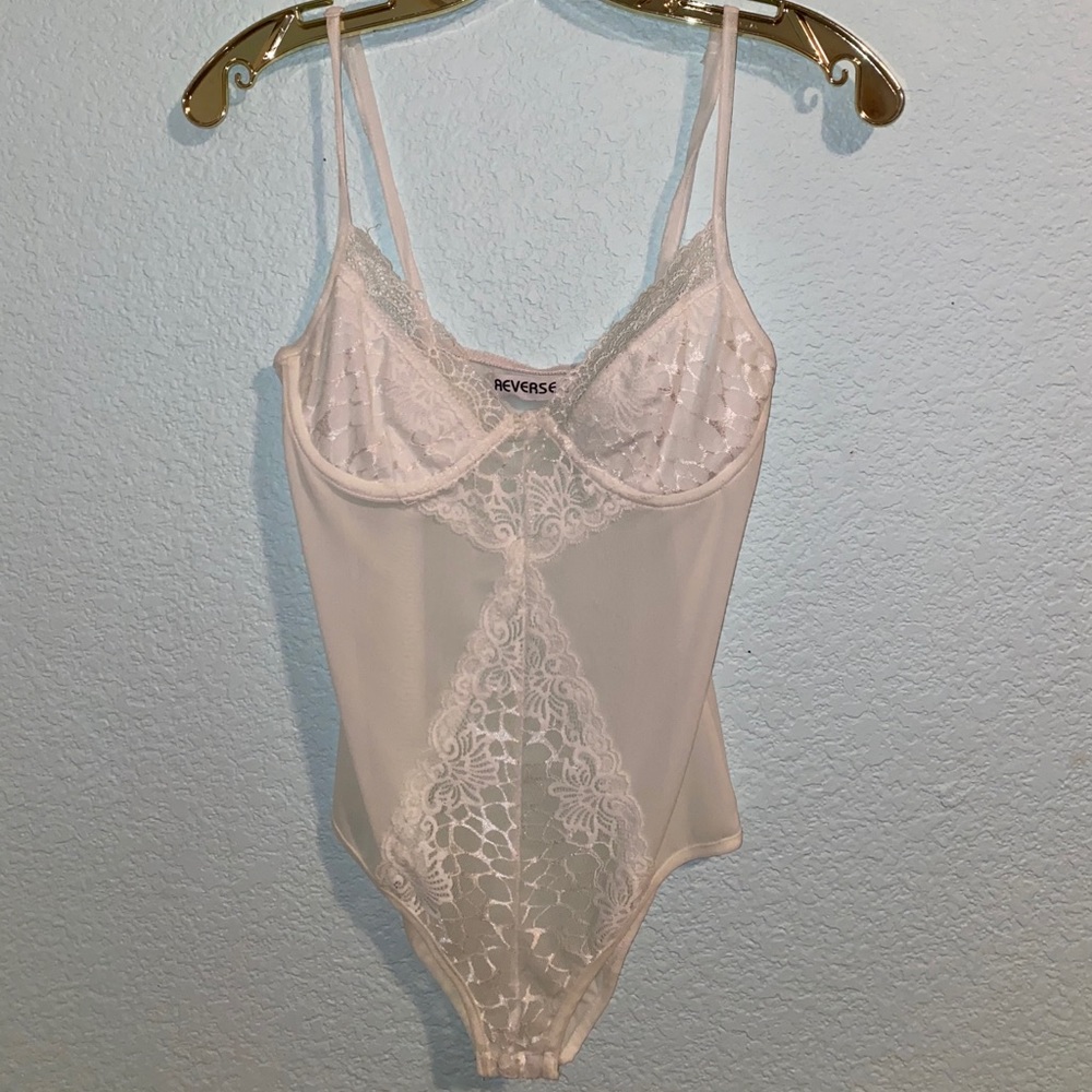 White peekaboo lace body suit